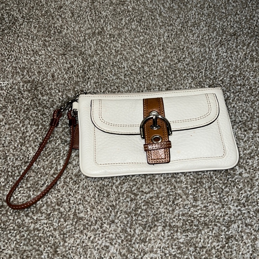 Vintage Coach white and brown leather wristlet clutch bag.